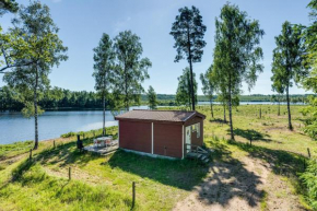 Holiday home with terrace and lake views